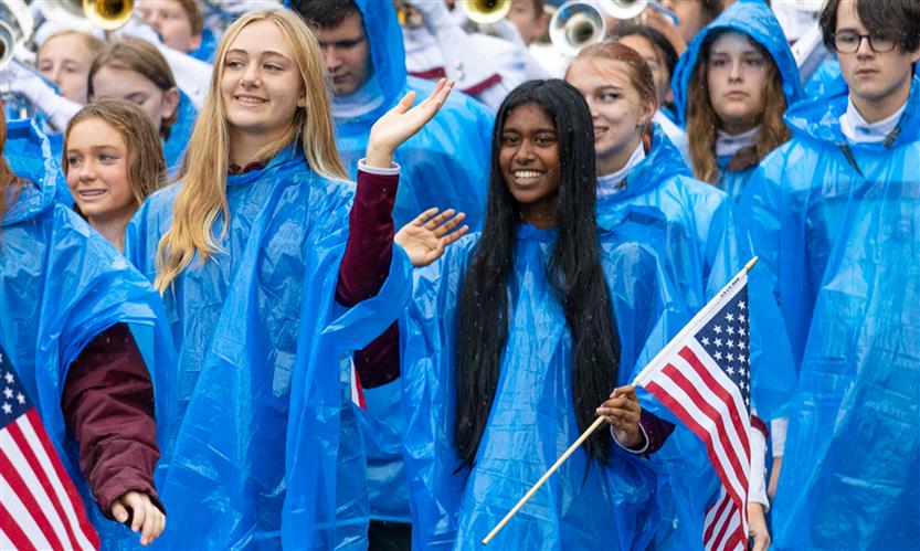 Students march in a Veterans Day Parade
